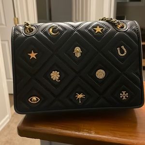 Small Tory Burch black Fleming black with gold charms! Hard to find bag!